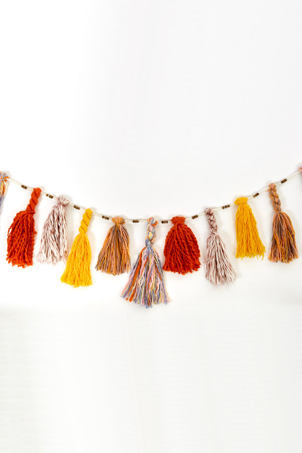 Tassel and Carved Bead Garland