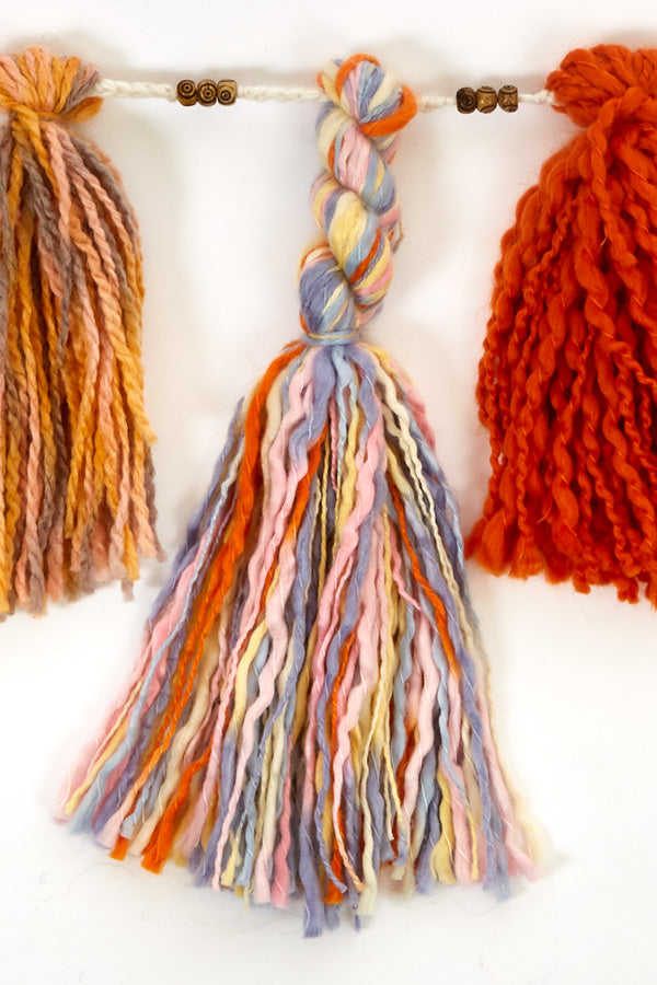 Tassel and Carved Bead Garland