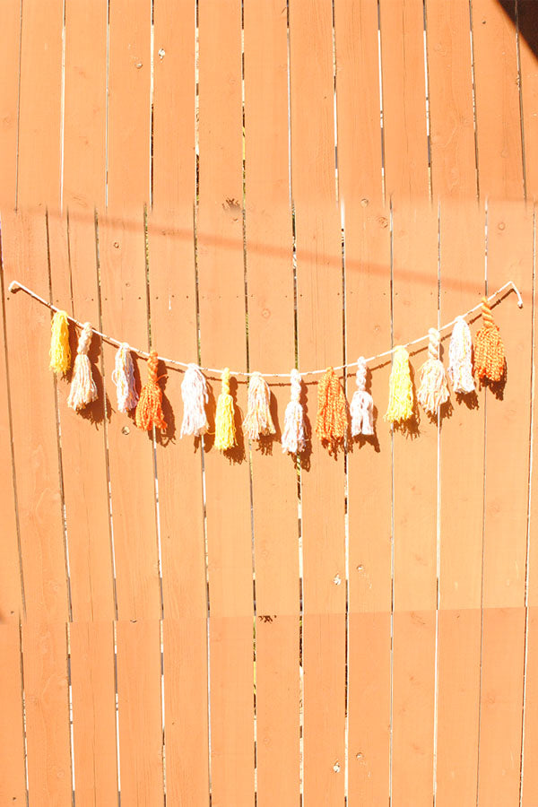 Tassel and Carved Bead Garland