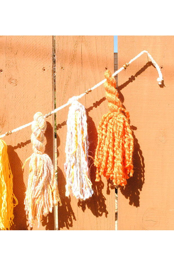 Tassel and Carved Bead Garland